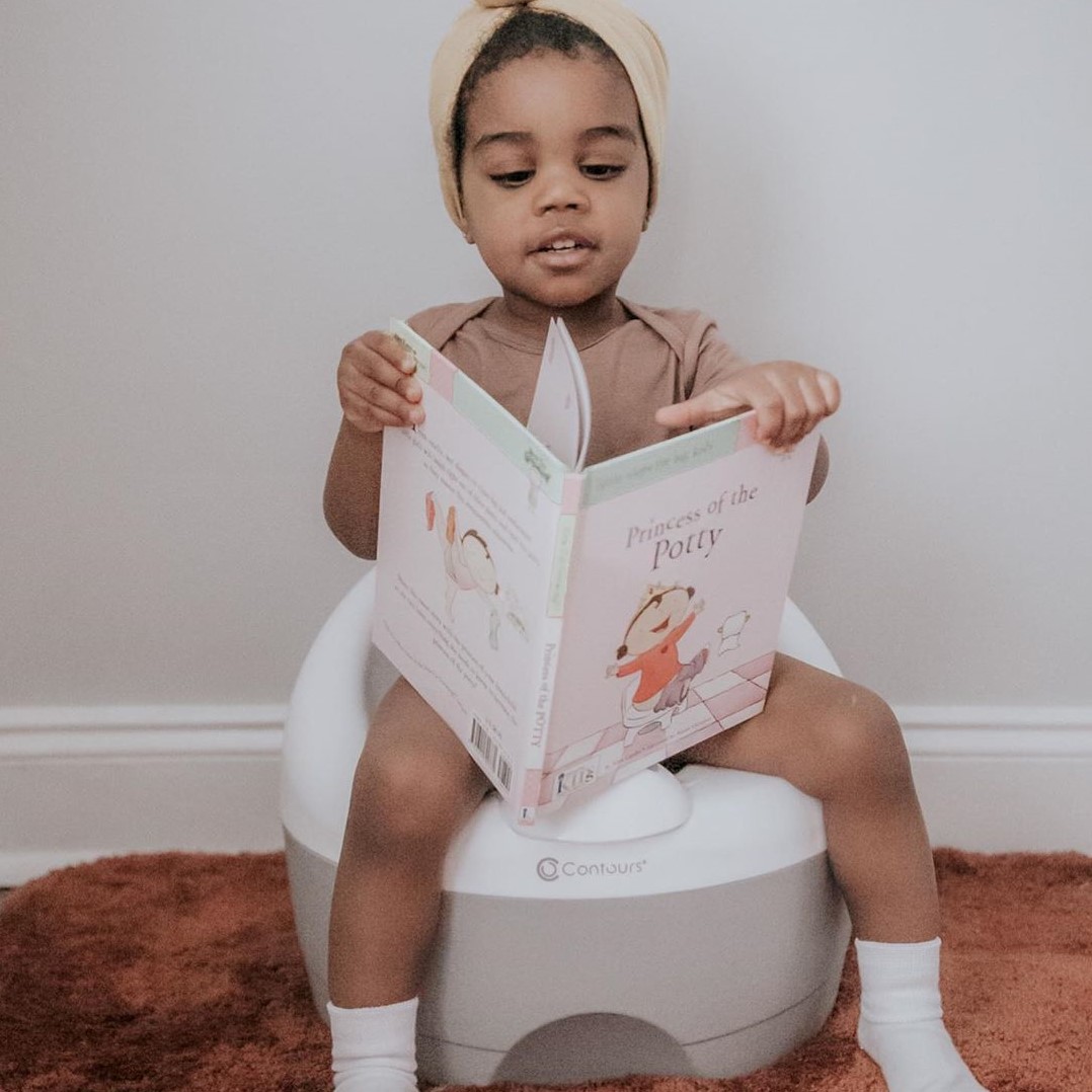 Toddler using the toilet trainer stage of the Bravo Potty