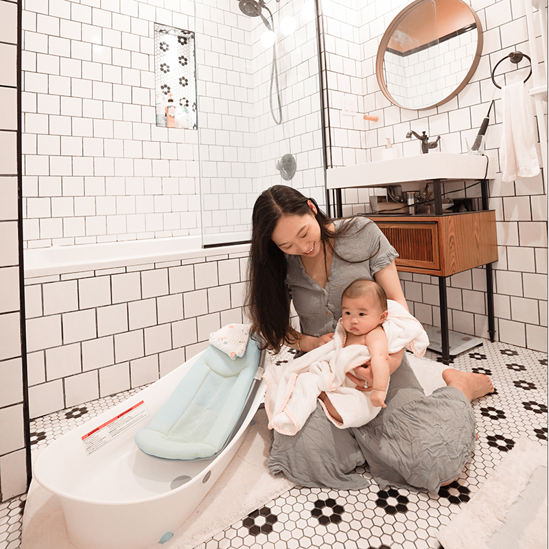 Baby in Oasis Bath Tub